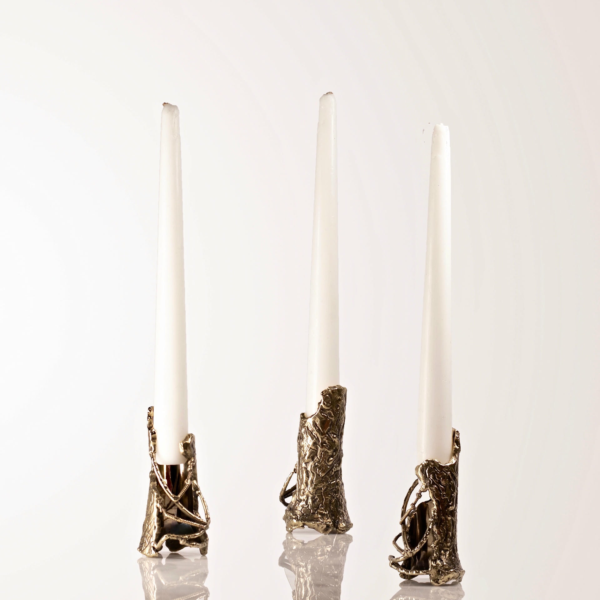 Ensemble of Hand Sculpted Flame Shaped Brass Candleholders by Samuel Costantini 2