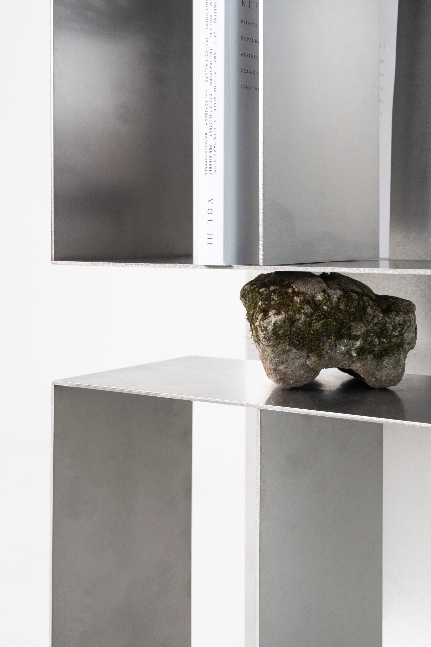 Interconnected Rectangular Prisms Stainless Steel Shelf with Stone by Lee Sisan 4