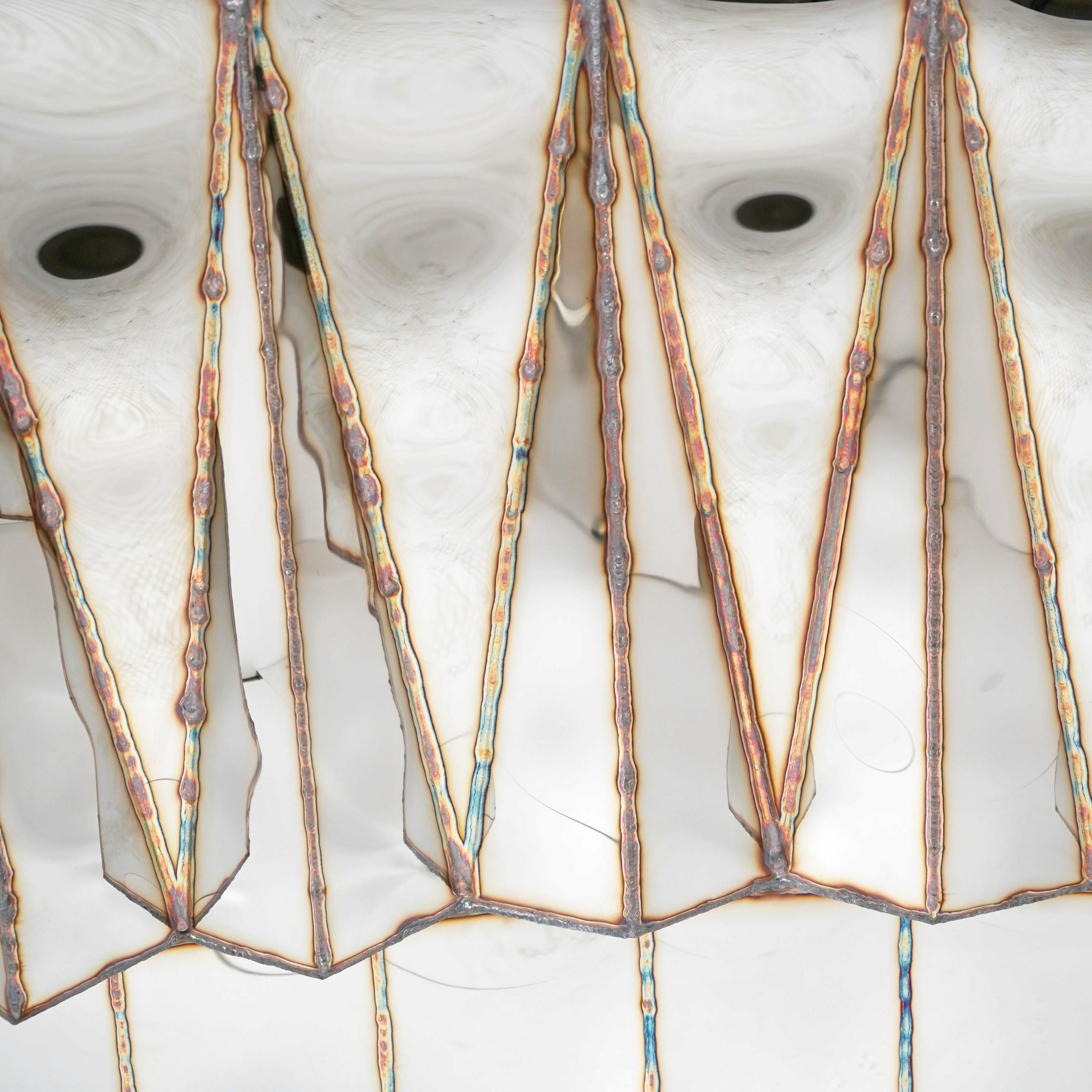 Jagged Edge Bar in Welded Mirror Polished Stainless Steel by Julian Mayor 3