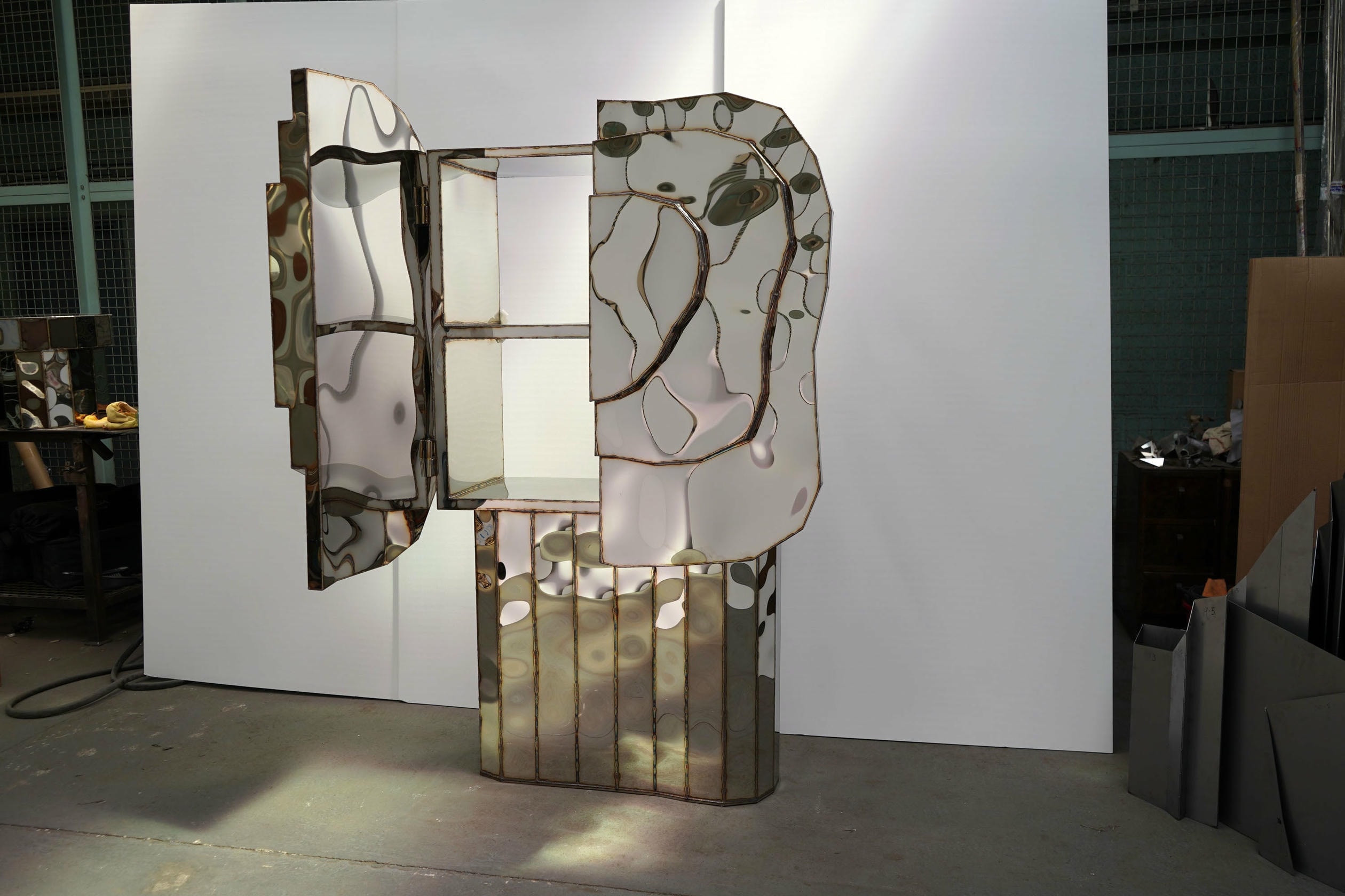 Steppe Wall Mounted Cabinet in Mirror Polished Stainless Steel by Julian Mayor 3