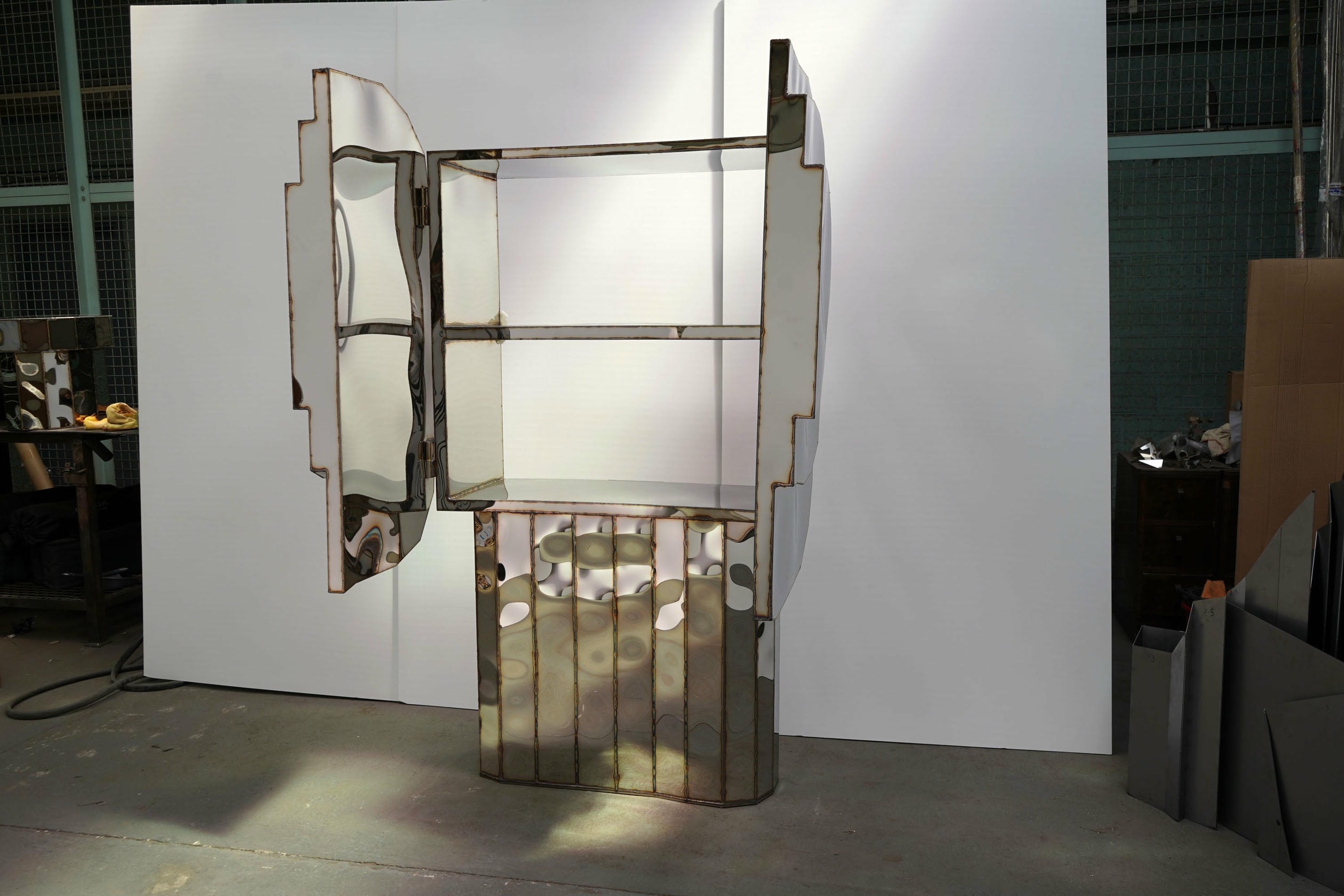 Steppe Wall Mounted Cabinet in Mirror Polished Stainless Steel by Julian Mayor 4