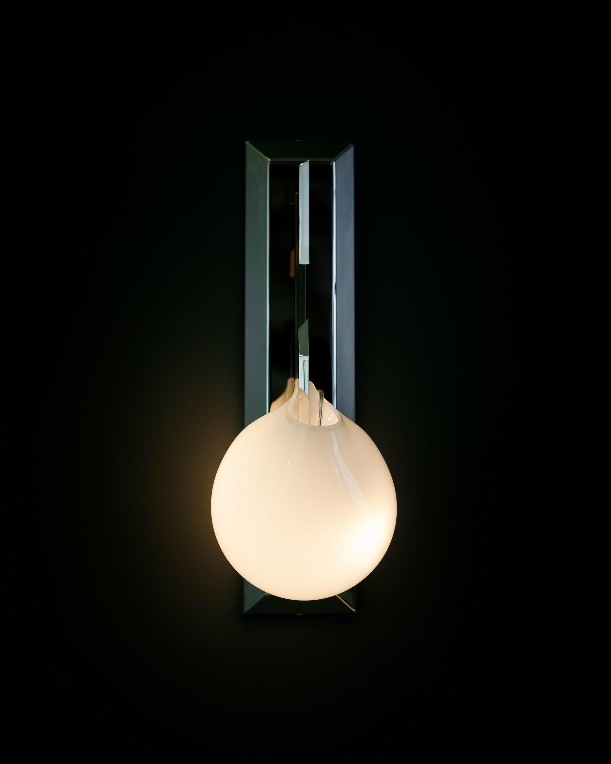 Unique Teardrop shaped Opal Glass with Brass Frame Sconce by Christopher Boots 2